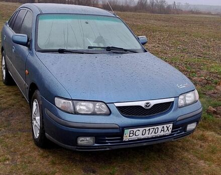 Синій Мазда 626, об'ємом двигуна 2 л та пробігом 231 тис. км за 2500 $, фото 1 на Automoto.ua