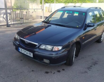 Синій Мазда 626, об'ємом двигуна 2 л та пробігом 429 тис. км за 2000 $, фото 1 на Automoto.ua
