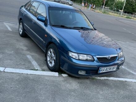 Синий Мазда 626, объемом двигателя 2 л и пробегом 390 тыс. км за 3200 $, фото 1 на Automoto.ua