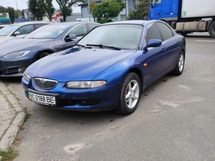 Синий Мазда 626, объемом двигателя 2 л и пробегом 100 тыс. км за 1500 $, фото 1 на Automoto.ua