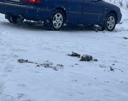 Синій Мазда 626, об'ємом двигуна 2 л та пробігом 310 тис. км за 3500 $, фото 1 на Automoto.ua