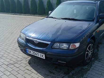 Синій Мазда 626, об'ємом двигуна 2 л та пробігом 440 тис. км за 1950 $, фото 1 на Automoto.ua