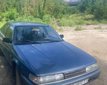 Синий Мазда 626, объемом двигателя 2 л и пробегом 200 тыс. км за 1500 $, фото 1 на Automoto.ua