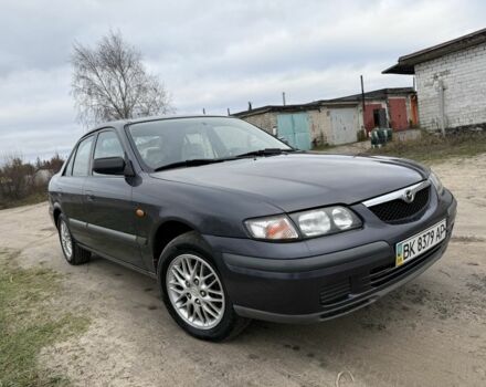 Синий Мазда 626, объемом двигателя 1.8 л и пробегом 247 тыс. км за 2000 $, фото 1 на Automoto.ua