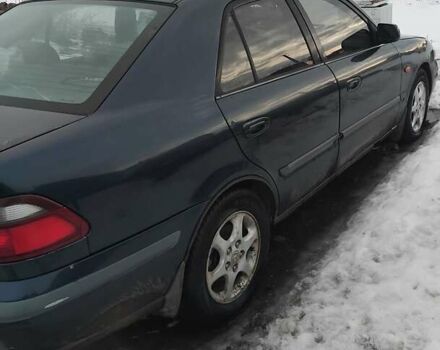 Синій Мазда 626, об'ємом двигуна 2 л та пробігом 300 тис. км за 1016 $, фото 1 на Automoto.ua