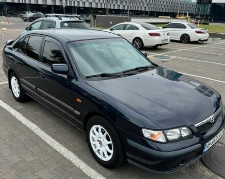 Синій Мазда 626, об'ємом двигуна 2 л та пробігом 312 тис. км за 3650 $, фото 1 на Automoto.ua