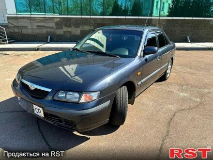 Синій Мазда 626, об'ємом двигуна 2 л та пробігом 260 тис. км за 3200 $, фото 1 на Automoto.ua