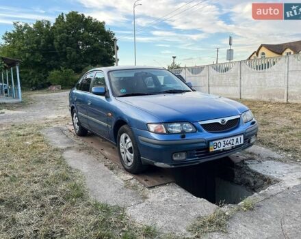 Синий Мазда 626, объемом двигателя 1.8 л и пробегом 355 тыс. км за 1350 $, фото 1 на Automoto.ua