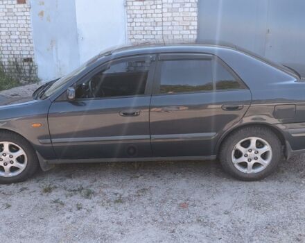 Синий Мазда 626, объемом двигателя 2 л и пробегом 220 тыс. км за 3300 $, фото 1 на Automoto.ua