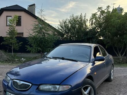 Мазда 626 1998 в Нововолынск на Automoto.ua Синий Мазда 626, объемом двигателя 2 л и пробегом 230 тыс. км за 1250 $, фото 1 на Automoto.ua