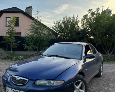 Синій Мазда 626, об'ємом двигуна 2 л та пробігом 230 тис. км за 1250 $, фото 1 на Automoto.ua