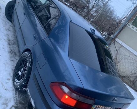 Синий Мазда 626, объемом двигателя 1.8 л и пробегом 399 тыс. км за 1600 $, фото 1 на Automoto.ua