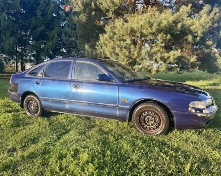 Синий Мазда 626, объемом двигателя 1.8 л и пробегом 309 тыс. км за 1299 $, фото 1 на Automoto.ua