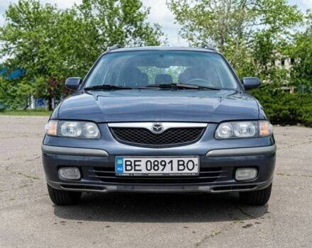 Синий Мазда 626, объемом двигателя 1.8 л и пробегом 344 тыс. км за 2550 $, фото 1 на Automoto.ua