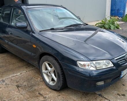 Синий Мазда 626, объемом двигателя 2 л и пробегом 385 тыс. км за 2900 $, фото 1 на Automoto.ua