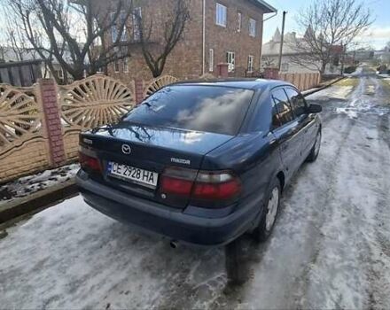 Синий Мазда 626, объемом двигателя 2 л и пробегом 310 тыс. км за 2500 $, фото 1 на Automoto.ua