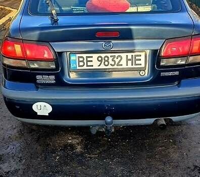 Синий Мазда 626, объемом двигателя 2 л и пробегом 400 тыс. км за 3000 $, фото 1 на Automoto.ua
