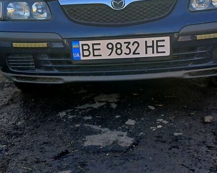 Синий Мазда 626, объемом двигателя 2 л и пробегом 400 тыс. км за 3000 $, фото 1 на Automoto.ua