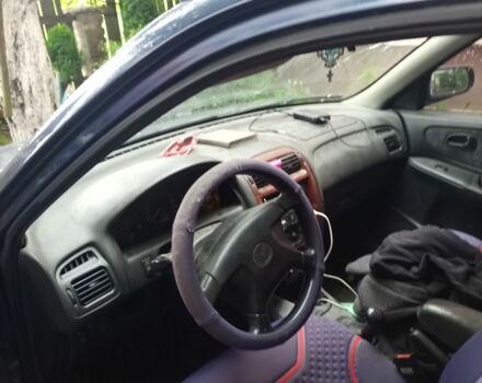 Синий Мазда 626, объемом двигателя 2 л и пробегом 400 тыс. км за 1400 $, фото 1 на Automoto.ua