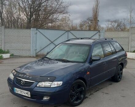 Синий Мазда 626, объемом двигателя 2 л и пробегом 290 тыс. км за 1800 $, фото 1 на Automoto.ua