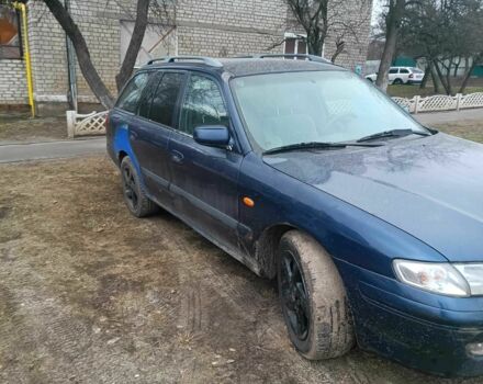 Синий Мазда 626, объемом двигателя 2 л и пробегом 350 тыс. км за 728 $, фото 1 на Automoto.ua