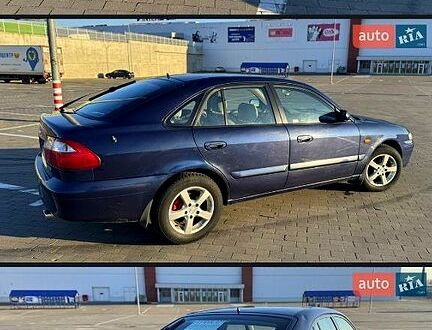 Синий Мазда 626, объемом двигателя 2 л и пробегом 230 тыс. км за 2700 $, фото 1 на Automoto.ua