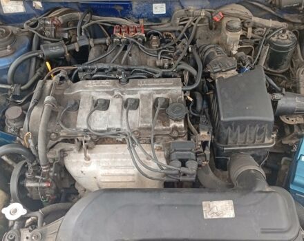 Синий Мазда 626, объемом двигателя 2 л и пробегом 145 тыс. км за 29 $, фото 1 на Automoto.ua