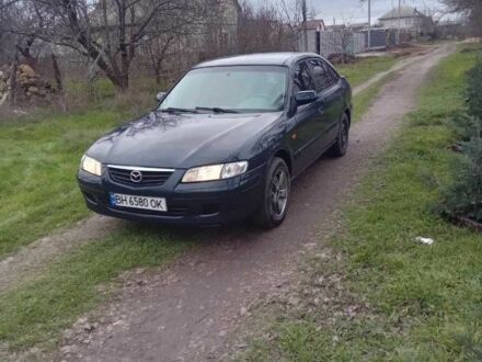 Синий Мазда 626, объемом двигателя 2 л и пробегом 2 тыс. км за 2700 $, фото 1 на Automoto.ua