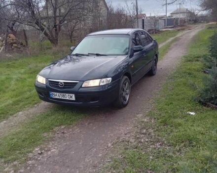Синій Мазда 626, об'ємом двигуна 2 л та пробігом 320 тис. км за 2700 $, фото 1 на Automoto.ua
