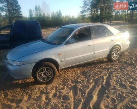 Синий Мазда 626, объемом двигателя 2 л и пробегом 300 тыс. км за 500 $, фото 1 на Automoto.ua