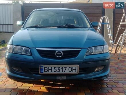 Синий Мазда 626, объемом двигателя 1.8 л и пробегом 454 тыс. км за 2650 $, фото 1 на Automoto.ua