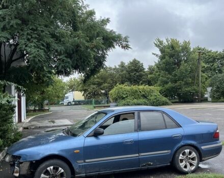 Синій Мазда 626, об'ємом двигуна 2 л та пробігом 300 тис. км за 600 $, фото 1 на Automoto.ua
