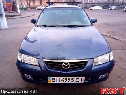 Синій Мазда 626, об'ємом двигуна 2 л та пробігом 348 тис. км за 2600 $, фото 1 на Automoto.ua