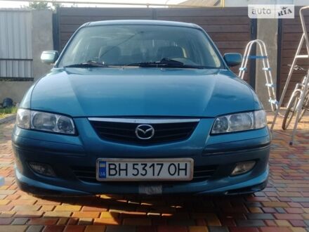 Синий Мазда 626, объемом двигателя 1.8 л и пробегом 454 тыс. км за 2650 $, фото 1 на Automoto.ua