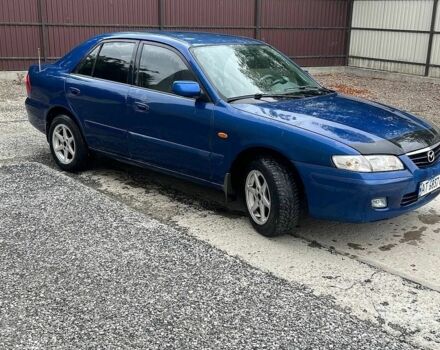 Синий Мазда 626, объемом двигателя 2 л и пробегом 355 тыс. км за 3000 $, фото 1 на Automoto.ua