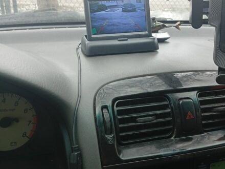 Синий Мазда 626, объемом двигателя 2 л и пробегом 145 тыс. км за 1392 $, фото 1 на Automoto.ua