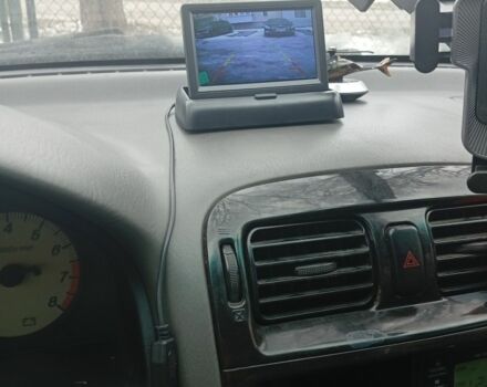 Синій Мазда 626, об'ємом двигуна 2 л та пробігом 145 тис. км за 1392 $, фото 1 на Automoto.ua