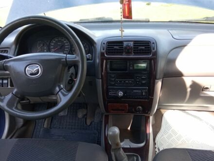 Синий Мазда 626, объемом двигателя 2 л и пробегом 431 тыс. км за 2300 $, фото 1 на Automoto.ua