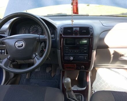 Синій Мазда 626, об'ємом двигуна 2 л та пробігом 431 тис. км за 2300 $, фото 1 на Automoto.ua