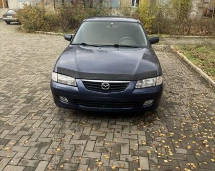 Синий Мазда 626, объемом двигателя 1.8 л и пробегом 395 тыс. км за 1500 $, фото 1 на Automoto.ua