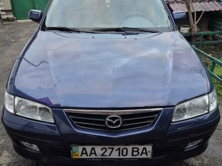 Синий Мазда 626, объемом двигателя 2 л и пробегом 245 тыс. км за 2500 $, фото 1 на Automoto.ua