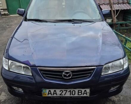 Синий Мазда 626, объемом двигателя 2 л и пробегом 245 тыс. км за 2500 $, фото 1 на Automoto.ua