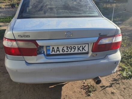 Синий Мазда 626, объемом двигателя 2 л и пробегом 400 тыс. км за 669 $, фото 1 на Automoto.ua