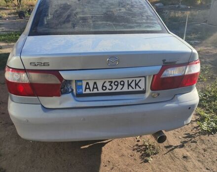 Синий Мазда 626, объемом двигателя 2 л и пробегом 400 тыс. км за 669 $, фото 1 на Automoto.ua