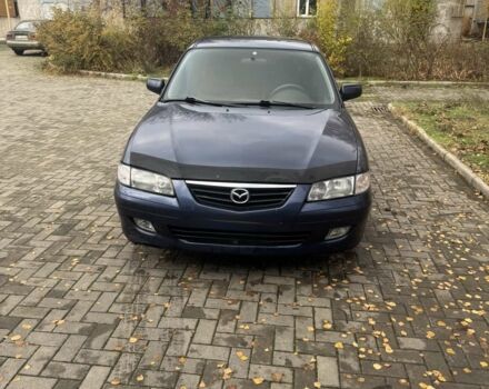 Синий Мазда 626, объемом двигателя 1.8 л и пробегом 395 тыс. км за 1500 $, фото 1 на Automoto.ua