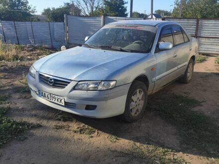 Синий Мазда 626, объемом двигателя 2 л и пробегом 400 тыс. км за 673 $, фото 1 на Automoto.ua