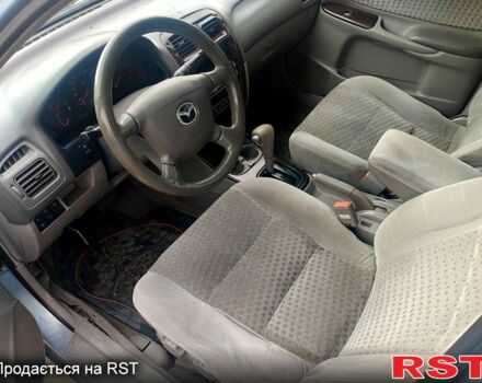Синий Мазда 626, объемом двигателя 2 л и пробегом 220 тыс. км за 1550 $, фото 1 на Automoto.ua