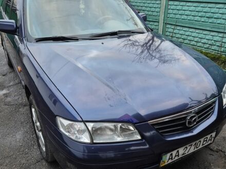 Синий Мазда 626, объемом двигателя 2 л и пробегом 245 тыс. км за 2500 $, фото 1 на Automoto.ua