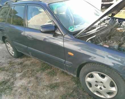 Синий Мазда 626, объемом двигателя 2 л и пробегом 285 тыс. км за 1900 $, фото 1 на Automoto.ua