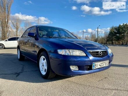 Синій Мазда 626, об'ємом двигуна 2 л та пробігом 365 тис. км за 2000 $, фото 1 на Automoto.ua